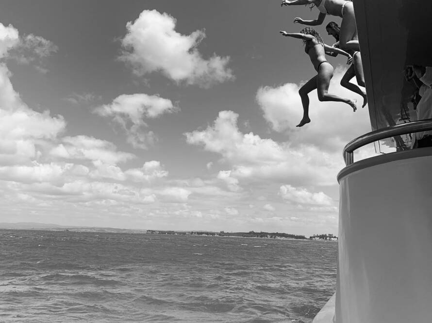 looking to cool down by jumping of the Templar Charter Yacht